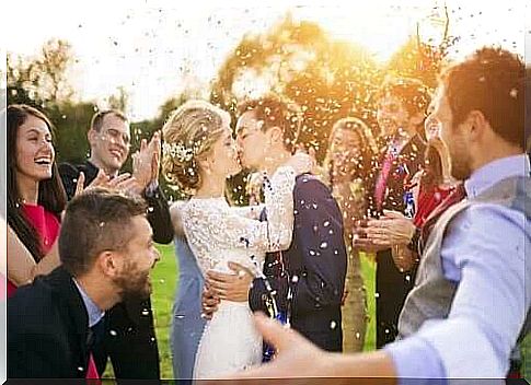 Bridesmaids and grooms assist at the wedding