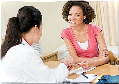 a woman talking to her doctor